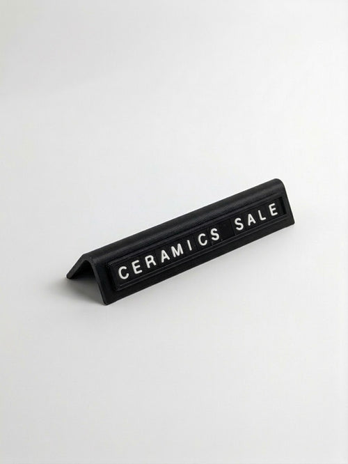 black reusable countertop price sign for cafés and bakeries with interchangeable letter tiles