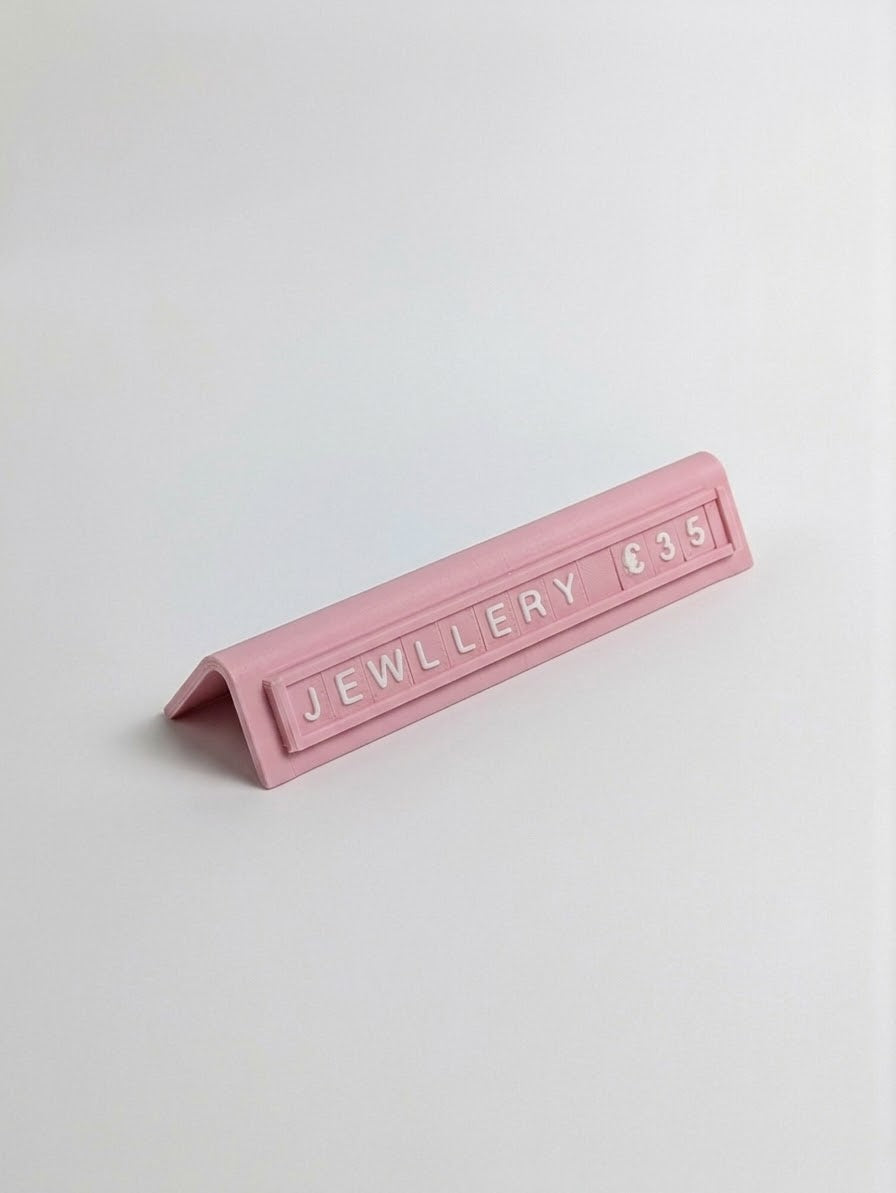 pink reusable countertop price sign for cafés and bakeries with interchangeable letter tiles